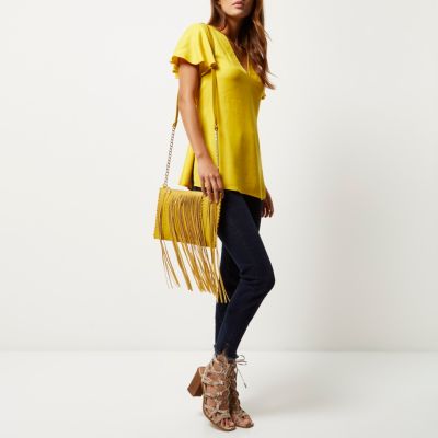Yellow fringed cross body handbag